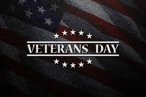 Veterans Day inscription on black textured background with USA flag. American holiday poster. Banner, flyer, sticker, greeting card, postcard.