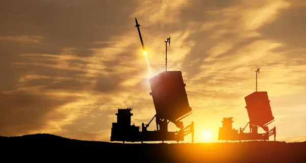 Israel's Iron Dome air defense missile launches. The missiles are aimed at the sky at sunset. Missile defense, a system of salvo fire.