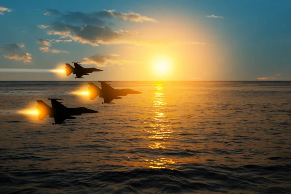 Día Fuerza Aérea Siluetas Aviones Sobre Fondo Puesta Sol Mar Fotos de stock libres de derechos