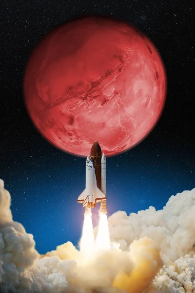 Spaceship lift off. Space shuttle with blast and smoke takes off to the red planet mars. Mars concept. Spacecraft lift off to explore other planets. Elements of this image furnished by NASA.