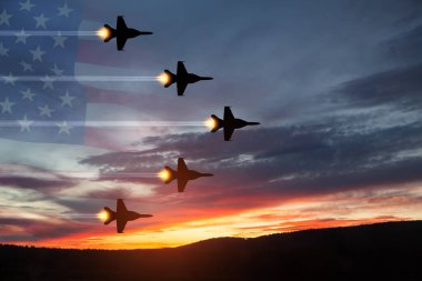 Air Force Day. Aircraft silhouettes on background of sunset with a transparent American flag.