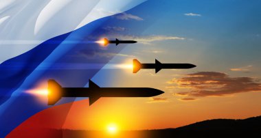 Fired missiles fly to the target. Missiles at the sky at sunset with Russian flag. Missile defense, a system of salvo fire. clipart