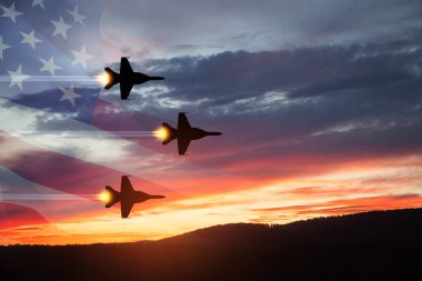 Air Force Day. Aircraft silhouettes on background of sunset with a transparent American flag.