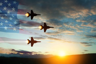 Air Force Day. Aircraft silhouettes on background of sunset with a transparent American flag.