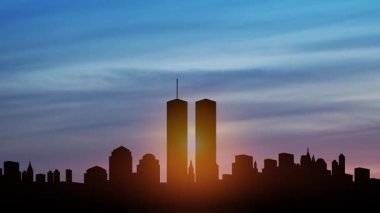 Gün batımında Towers ile New York silueti. 09.11.2001 Amerikan Vatanseverlik Günü videosu.