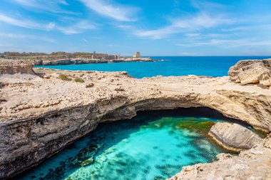 The famous Grotta della Poesia, Lecce, Adriatic Sea in the Salento region of Puglia, Italy. clipart