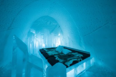 Jukkasjarvi, Sweden - January 04, 2022 : Ice art and furnitures at Ice Hotel in Jukkasjarvi, Sweden clipart