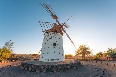 Ancient traditional stone windmill, Fuerteventura, El Cotillo. Canary Islands clipart