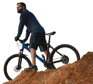 Pantolon ve yün ceketli bir bisikletçi. Havalandırma çatallı, modern bir karbon motorlu. Tepedeki adam bisiklete biniyor..