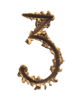 Üç numara kumlu bir plajda yazılmış. El yazısı karakter koleksiyonu.