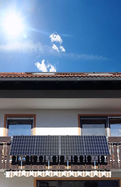 stock image A balcony power plant is also suitable for older houses. Solar modules for power generation on a balcony 