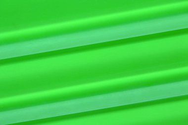 Camdan yapılmış yeşil bir arka fonun yakın plan görüntüsü