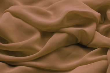 Close-up of a soft fabric in Mocha Mousse  clipart