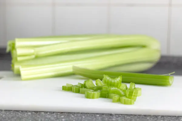 Celery Stalks Kitchen Board Royalty Free Stock Photos