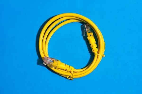 a yellow cable network on blue background