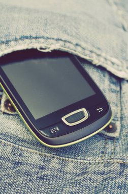 Kotun cebindeki akıllı telefon