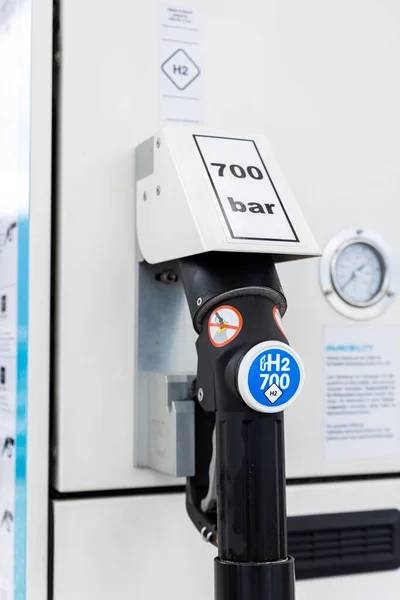 Close-up detail view of hydrogen fuel filler nozzle nozzle adapter car H2 gas filling station in Germany. Refueling vehicle with renewable innovative zero emission product. Future safety technology.