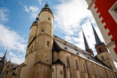 Scenic view Marktkirche Market Church of Our Dear Lady at Halle on Saale in Saxony-Anhalt Germany against sunny blue sky . Medieval historical architecture tourism travel destination. clipart