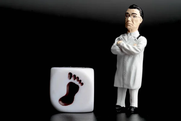 Miniature Figurine Podiatrist Doctor Black Background — Stock Photo, Image