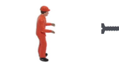 Tornavidayla düzüşen bir işçinin minyatür biblosu.