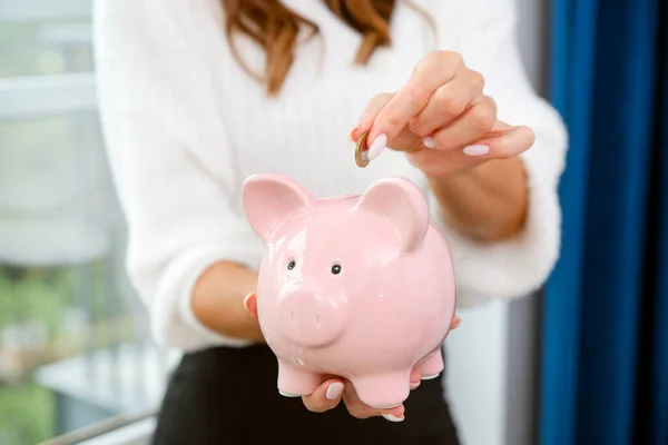 Woman Putting Coin Piggy Bank Savings Concept — Stock Photo, Image