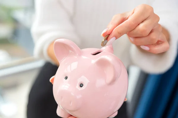 Woman Putting Coin Piggy Bank Savings Concept — Stock Photo, Image