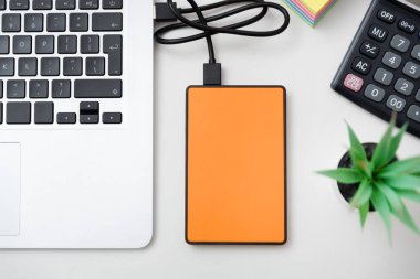External backup disk, USB hard drive connected to laptop