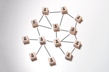 Ahşap bloklar ve simgelerle takım çalışması ve topluluk konsepti