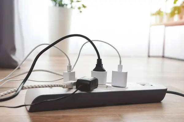 Electric power strip. Power plugs and a one multi socket electrical splitter with the surge protection.