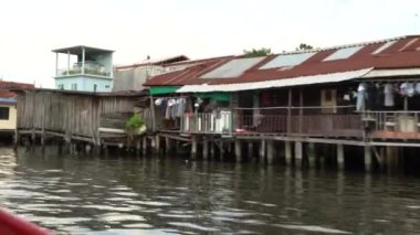 Riding a motor boat tour on Chao Phraya river in Bangkok, Thailand. 