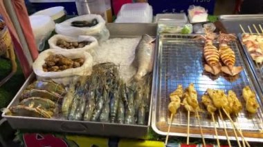 Street food vendor in Bangkok, Thailand making food