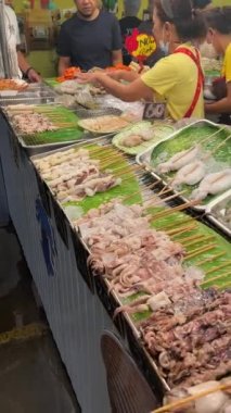 Street food vendor in Bangkok, Thailand making food