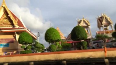 Riding a motor boat tour on Chao Phraya river in Bangkok, Thailand. 