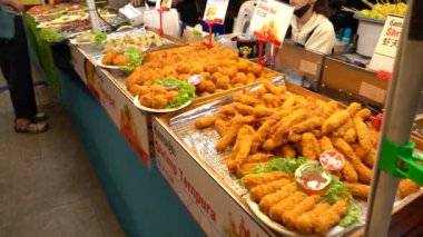 Street food vendor in Bangkok, Thailand making food