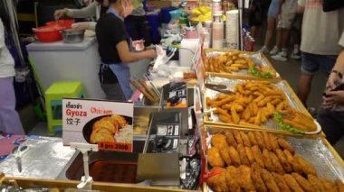 Street food vendor in Bangkok, Thailand making food