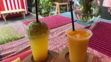 Delicious fresh squeezed mango smoothie.
