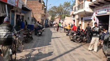 Living in Poverty in Agra, India. Walking the streets of poor living area.