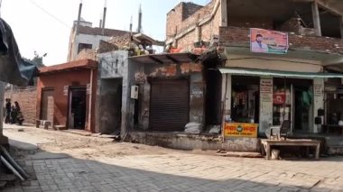 Living in Poverty in Agra, India. Walking the streets of poor living area.