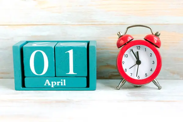 April Blue Cube Calendar Month Date Red Alarm Clock Wooden Royalty Free Stock Photos