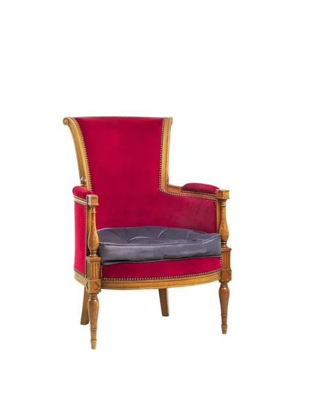 Antique red armchair isolated on white background.
