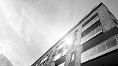 Apartments in residential complex. Housing structure at modern house.  Architecture for property investment. and architecture details. Urban abstract - windows of apartment building. Black and white.