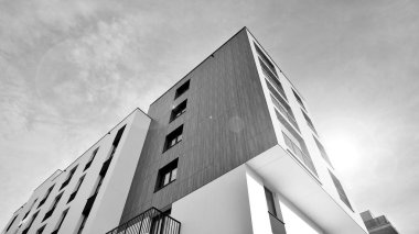 Apartments in residential complex. Housing structure at modern house.  Architecture for property investment. and architecture details. Urban abstract - windows of apartment building. Black and white.