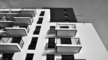 Apartments in residential complex. Housing structure at modern house.  Architecture for property investment. and architecture details. Urban abstract - windows of apartment building. Black and white.