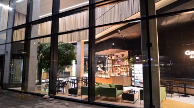 Warsaw, Poland. 19 January 2023. The interior of the Forest office building in the evening. Forest  is modern office space  for multiplying goods and ideas. Corporate needs a friendly office space. 