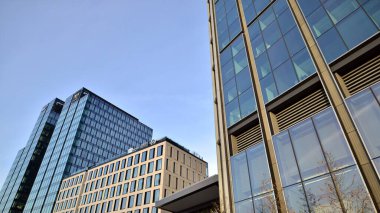 Warsaw, Poland. 10 February 2023. Varso Place office building. Facade texture of a glass mirrored office building.