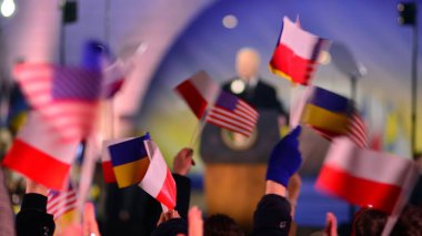 Politician in suit  and  of  flags  Blurred picture