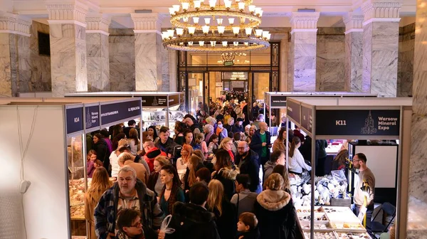 stock image Warsaw, Poland. 5 March 2023. Warsaw Mineral Expo 2023. People are looking and buying minerals and precious stones exhibited at the fair.