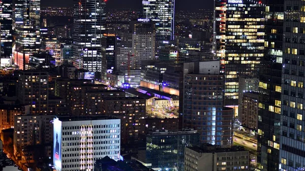 stock image Warsaw, Poland. 14 March 2023. Beautiful architecture of Warsaw city center with modern skyscrapers at night.