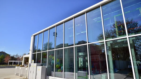 stock image Warsaw, Poland. 21 April 2023. The building that houses the Food Hall Ogrody Urlicha. It's a modernized old greenhouse.