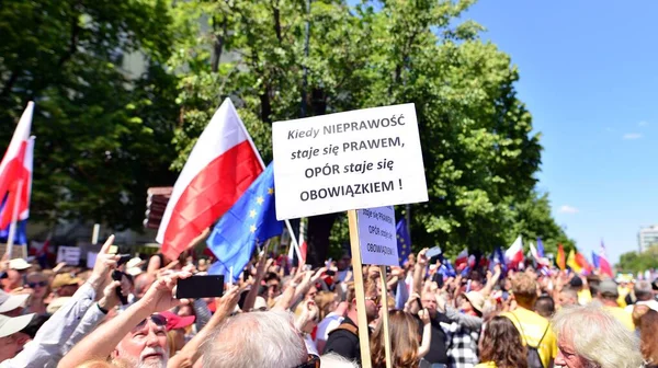 stock image Warsaw, Poland. 4 June 2023. Hundreds of thousands march in  anti-government protest to show support for democracy. The spontaneous reaction of people during the great March of the opposition.